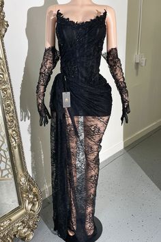 Crafted with premium materials, including lace, rayon, nylon, and spandex, it will bring an elegant and sophisticated look to your wardrobe. Plus, the included lace gloves complete the look.