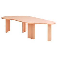 an oval shaped table with two legs and a curved top, in light pink color