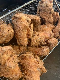 fried food is being cooked in a fryer