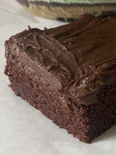 a piece of chocolate cake sitting on top of a table