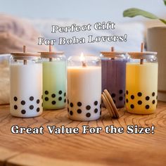 four candles are sitting on a table with the words, perfect gift for boba lovers great value for the size