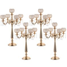 four gold candelabra with crystal balls on each candle holder, set of 4