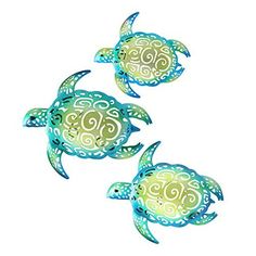 three blue and green sea turtles swimming in the ocean with swirly designs on their backs