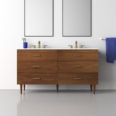 two mirrors on the wall next to a wooden dresser with drawers and sinks in front of it