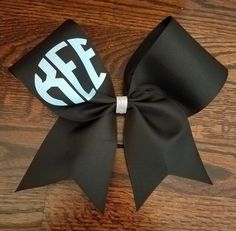 3 inch wide grosgrain ribbon with Glitter HTV. Hair tie attached. Bows are made stiff. Please specify if you wish center tie to be in a different color. Message me if you do not see your color listed. Hair Streamer, Competition Bows, Dance Bows, Softball Bow, Custom Cheer Bows, Softball Bows, Glitter Cheer Bow, Glitter Chevron, Personalized Bow