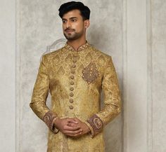 A Perfect Blend" Exactly What You Have Been Looking For This Wedding Beige Pattern Work Indo-Western Sherwani In Kashmiri Jamawar Fabric * Fabric - Kashmiri Jamawar * Work Type - Pattern Work, Fancy Button, Glass Stone Broch, Zari Buti, Self-Weaved Patterns * Top Colour - Beige Bottom - Red Dupion Silk   Note For Perfect Fitting * Pls Check Your Body Chest Exact Measurement With Out Adding Any Space or Gap From Your Side * Kindly Mention Your Height While Placing The Order * For custom Stitching as per your body measurements @ 20 USD kindly get in touch Pls Not - We can Also provide Jewellery, Shoe & Stole 🔺Disclaimer: Product Colour May Slightly Vary Due to Photographic Lighting Sources or Your Monitor Settings Thank You for Visiting Beige Suit Men Wedding, Groom Suit Beige, Beige Suit Men, Wedding Suit Indian, Men Groom Suit, Men Wedding Sherwani, Wedding Suit Men, Men Wedding Suit, Sherwani Wedding