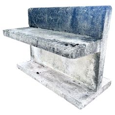 an old concrete bench is shown against a white background