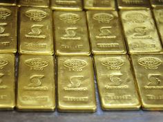 several rows of gold bars stacked on top of each other