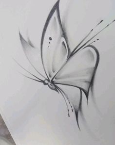 a drawing of a butterfly on a piece of paper