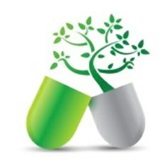 a green capsule with a tree growing out of it, on a white background stock photo