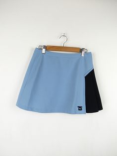 Tennisport 80s vintage tennis skirt, light blue and black Made in Italy Size M (pay attention to the measurements!) Measures Waist width: 36 cm (very elastic Total length: 36cm Condition: It is in excellent condition, with small, barely visible stains on one side Our garments are all vintage and second hand. Any signs of wear or defects are documented with photos and description. For any questions, photos, videos we are at your disposal.🌈 Blue Tennis Skort For Summer, Blue Tennis Skort For Spring, Retro Blue Fitted Skort, Blue Stretch Tennis Skirt, Blue Sporty Mini Skort, Sporty Blue Mini Skort, Sporty Blue Skort, Blue Stretch Tennis Skort, Blue Stretch Skort For Tennis