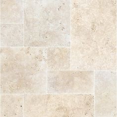 a tile floor with white and beige colors