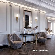 a room with two chairs and a table in front of some mirrors on the wall