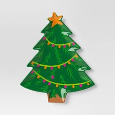 a green christmas tree with lights on it's sides and a star hanging from the top