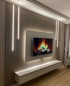 a living room with a fire place in the center and some curtains on the wall