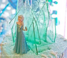 a frozen princess cake with frosting and icing