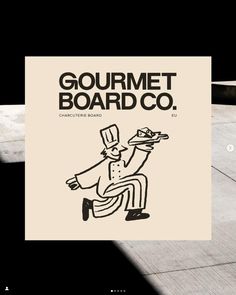 a man riding a skateboard down a sidewalk next to a street sign that reads gourmet board co