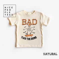 This Bad Two the Bone Toddler Tee is perfect for funny two-year-olds celebrating their second birthday! Made with 100% cotton, this lightweight tee is comfortable for active toddlers. The design adds a playful touch to any toddler's wardrobe, making it a great gift for a two-year-old's birthday. Product features - Side seams for added structure - Variety of fiber compositions available - 100% airlume combed and ring-spun cotton for quality - Lightweight fabric for comfort - Tear-away label for convenience Care instructions - Machine wash: cold (max 30C or 90F) - Do not bleach - Tumble dry: low heat - Iron, steam or dry: low heat - Do not dry clean Toddler Graphic Tee, Toddler Top, Toddler Humor, Old Shirts, Toddler Tees, Kids Tops, Short Sleeve Tee, Graphic Tees, Kids Outfits