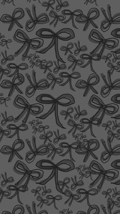 black and gray abstract design with swirls on grey background, for wallpaper or fabric