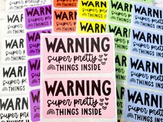 several stickers with the words warning on them in different colors and sizes are shown