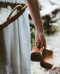 Rustic design features on an all-time classic. Athens in Dexter Tan Nubuck leather with a dark wooden base. ⁠ ⁠ #handmadewithlove #handcrafted #fashion #shoes #clogs White Dress Flowers, Aesthetic White Dress, Brown Clogs, White Flower Dress, Aesthetic White, Just You And Me