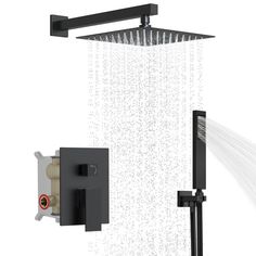 an overhead shower head with thermostaer and hand held showerhead in front of it