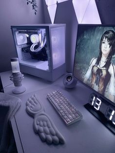 a desktop computer sitting on top of a desk next to a keyboard and monitor screen