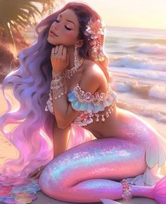 a beautiful mermaid sitting on top of a sandy beach next to the ocean and holding her hand under her chin