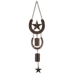 a metal wind chime with a star and moon hanging from it's side