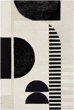 an abstract rug with black and white shapes on it's sides, including two circles