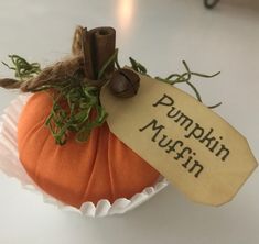 there is a pumpkin with a tag on it