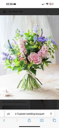 a bouquet of flowers sitting on top of a table