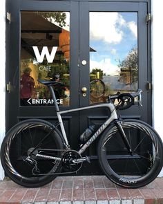 a bike parked in front of a building