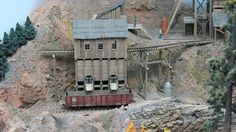 a model train set on top of a mountain