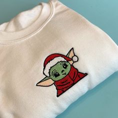 Baby Yoda x Christmas Holiday Inspired Embroidered Sweatshirt Crewneck Christmas Embroidery Sweatshirts, Dcp Outfits, Cute Christmas Sweaters, Embroidery Machine Applique Designs, Classy Halloween Costumes, Cute Christmas Sweater, Cute Birthday Pictures, Diy Sweatshirt