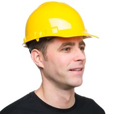 a man wearing a yellow hard hat