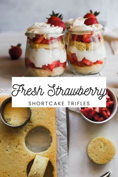 fresh strawberry shortcakes in glass jars with strawberries on the side and another dessert next to them