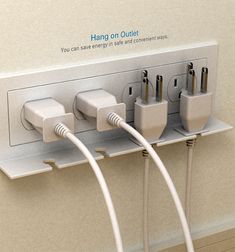 an electric outlet with three plugs attached to it