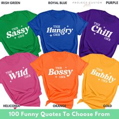 Get ready to be the life of the party with our custom "The _ One" funny shirts, perfect for any occasion! Whether you're planning a girls' trip, a bachelorette party, or a family vacation, these personalized tees are a must-have. Customize each shirt with a unique title to match the vibe, and make memories that last. Ideal as a fun gift for birthdays or any celebration, these shirts add a playful touch to any event. Order now to create a one-of-a-kind souvenir that everyone will love! Our Funny Funny Group Tshirt Ideas, We Are Family Tee Shirts, Friends Vacation Shirts Funny, Funny Girls Trip Shirts, Fun Graphic T-shirt For Family Vacation, Fun Graphic Print T-shirt For Family Vacation, Graphic Tee T-shirt For Family Vacation, Family Vacation T-shirt With Custom Print, Travel Tshirt