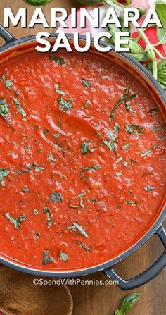 marinara sauce in a pan with basil on top and the words marinara sauce above it