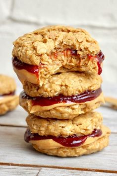 oatmeal and jelly cookies stacked on top of each other