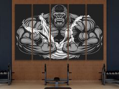 an image of a gorilla with muscles on it's chest in a gym room