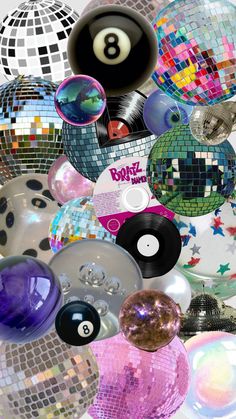 an array of disco balls and vinyl records