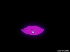 a black background with a purple lip in the dark