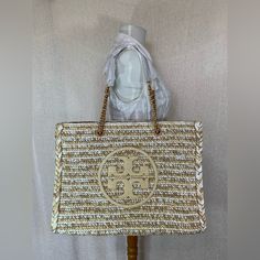 Brand New! Price Is Firm. Tory Burch Raffia Ella Large Tote In Natural Raffia Body With Leather Trim. Open Top Leather And Chain Strap With 9.2" Drop Single Compartment With Removable Zippered Pouch Height: 17.3"; Length: 13.5"; Depth: 7.2" Style Number 88084 Comes With A Dust Bag. Designer Rectangular Straw Bag With Gold-tone Hardware, Luxury Beige Straw Bag With Gold-tone Hardware, Luxury Straw Bag With Gold-tone Hardware, Luxury Rectangular Straw Bag, Luxury Gold Straw Bag With Braided Handles, Luxury Natural Straw Bag With Gold-tone Hardware, Designer Beige Rectangular Straw Bag, Luxury Straw Bags With Gold-tone Hardware, Luxury Beige Straw Bag For Travel