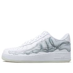 Looking for a shoe that will make you stand out this Halloween? Look no further than the Nike Air Force 1 07 Low Skeleton QS. This eye-catching shoe features a white leather upper with an anatomical skeletal foot graphic. The All Hallows Eve inspiration continues with the Nike branding written in bones, with even more bone graphics emerging on the insole. A translucent outsole rests underfoot, providing a finishing touch to this spooky shoe. Halloween Sneakers, All Hallows Eve, Nike Air Force 1 07, Nike Brand, Nike Air Force Ones, Nike Air Force 1 Low, Air Force Ones, Halloween Looks, Air Force 1 Low