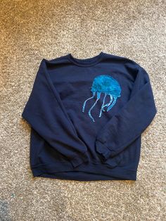 Hand sewn lettering, you can choose the color of the words and jellyfish! Blue Embroidered Crew Neck Hoodie, Blue Crew Neck Hoodie With Embroidered Graphics, Blue Casual Sweater With Letter Embroidery, Blue Streetwear Sweatshirt With Embroidered Text, Blue Embroidered Text Sweatshirt For Streetwear, Blue Sweatshirt With Embroidered Text For Streetwear, Casual Blue Sweatshirt With Letter Embroidery, Jellyfish Outfit, Sewed Clothes