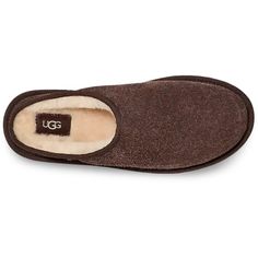 Bringing depth and dimension to your favorite slip-on. We designed the Classic Slip-On Shaggy Suede slipper with a textured suede face that looks as cozy as it feels. Peek inside and you'll find our soft UGGplush™ wool-blend lining and a luxurious sheepskin insole. Crafted on our lightweight sugarcane EVA outsole and classic footbed. Suede upper 17mm UGGplush™ 60% upcycled wool, 40% TENCEL™ Lyocell lining 10mm sheepskin insole Sugarcane EVA outsole Textile binding made from 100% recycled polyest Mens Clogs, Waterproof Sneakers, Suede Slippers, Design Textile, Mens Uggs, Shoe Insoles, Boys Boots, Sandals For Sale, Boots And Sneakers