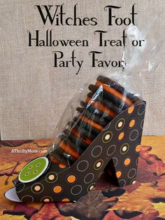 witches foot halloween treat or party favors on a table with text overlay that reads, witches foot halloween treat or party favors