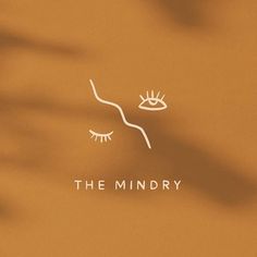 the mindy logo is shown in white on an orange background with long eyelashes and eyeliners